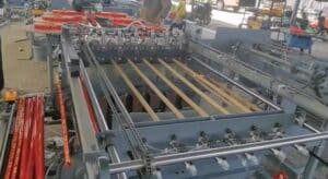 Automatic-Mop-Stick-Handle-Tube-Film-Inserting-Machine-with-Head-Shrinking-Function